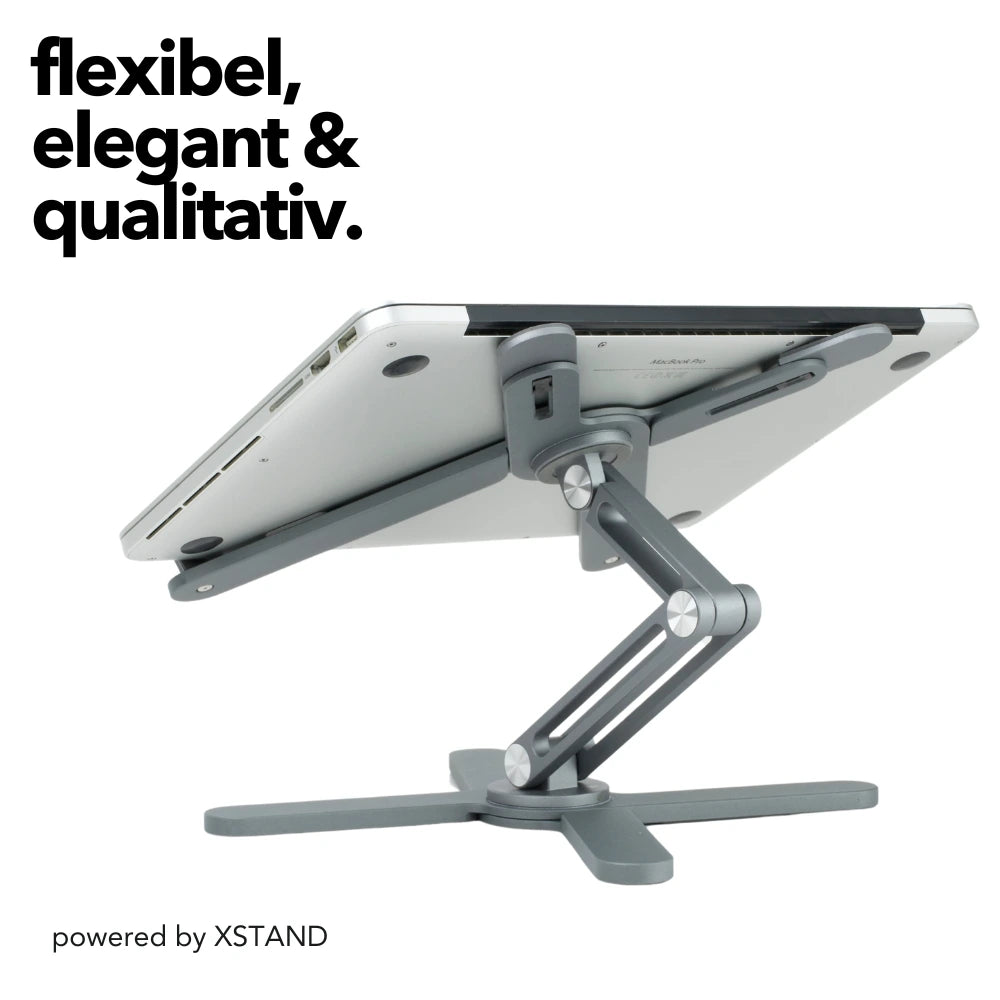 XSTAND Laptophalter mit einem MacBook, zeigt die flexible, elegante und hochwertige Konstruktion für maximale Stabilität.